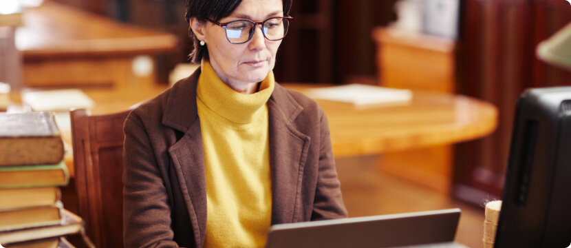 Librarian working on computer