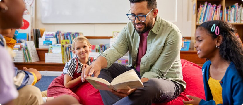 Librarian reading to a room of kids